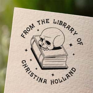 Personalized book stamp impression on white paper