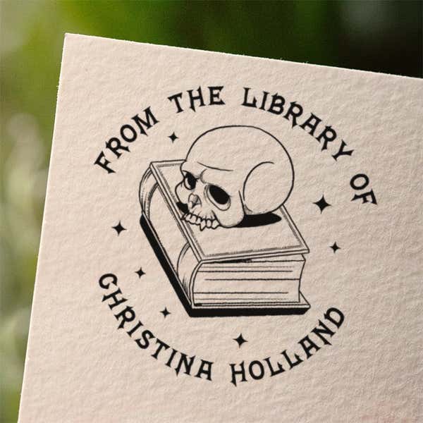 Personalized book stamp impression on white paper