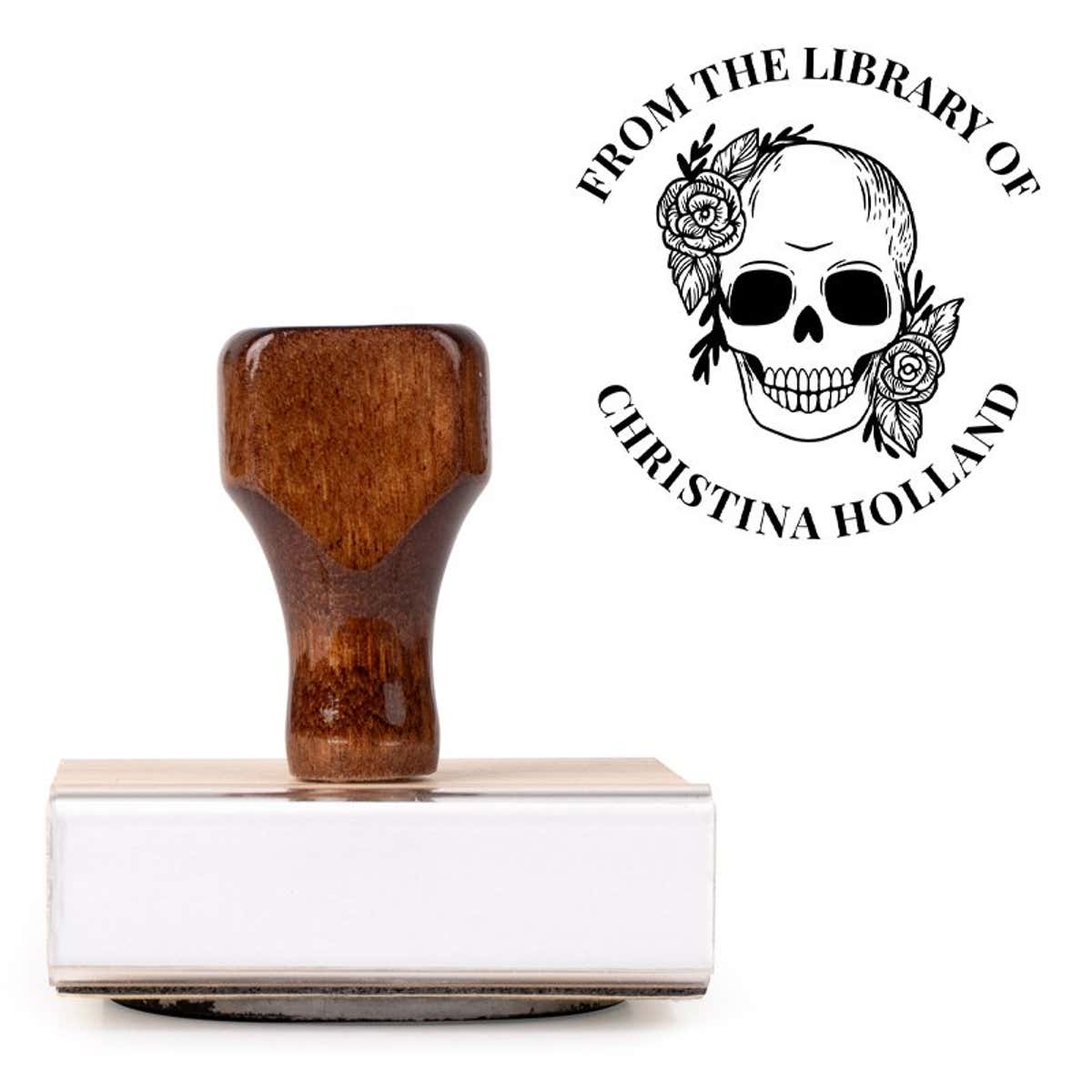 Front view of wood handle stamp body with library book stamp impression