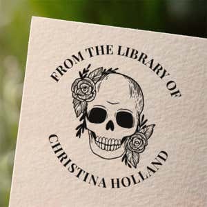 Personalized book stamp impression on white paper