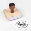Wood handle stamp body with book stamp impression