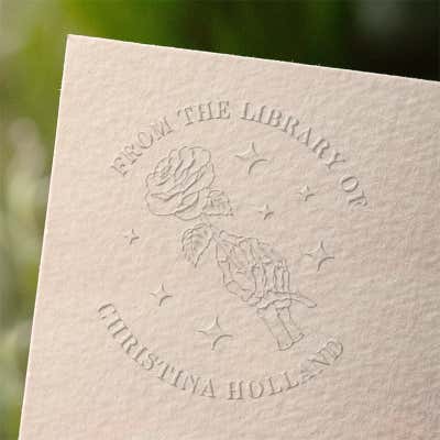 Rose Bones custom book embosser impression on paper