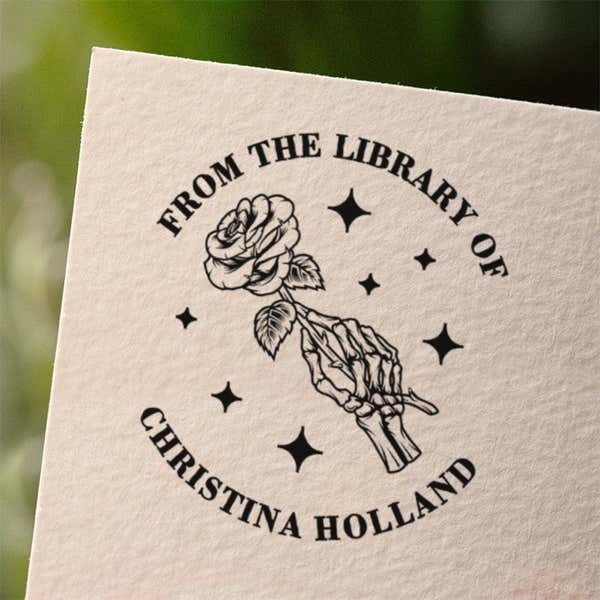 Personalized book stamp impression on white paper