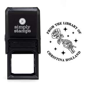 Front view of self-inking stamp body with library book stamp impression example