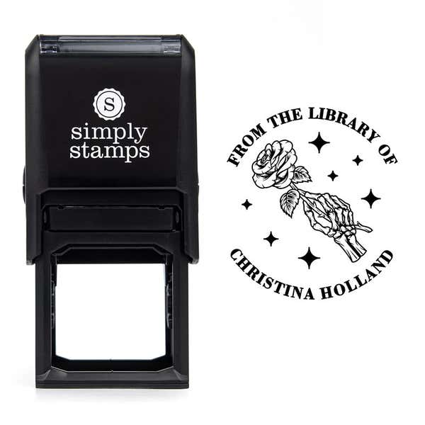 Front view of self-inking stamp body with library book stamp impression example