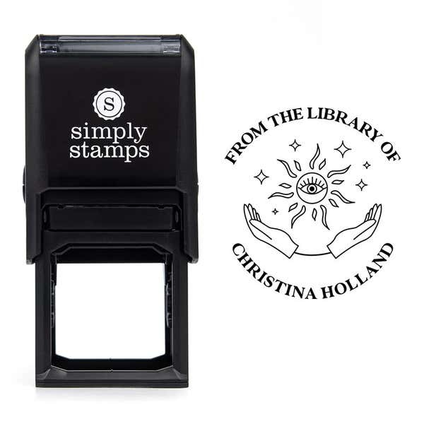 Front view of self-inking stamp body with library book stamp impression example