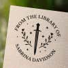 Personalized book stamp impression on white paper