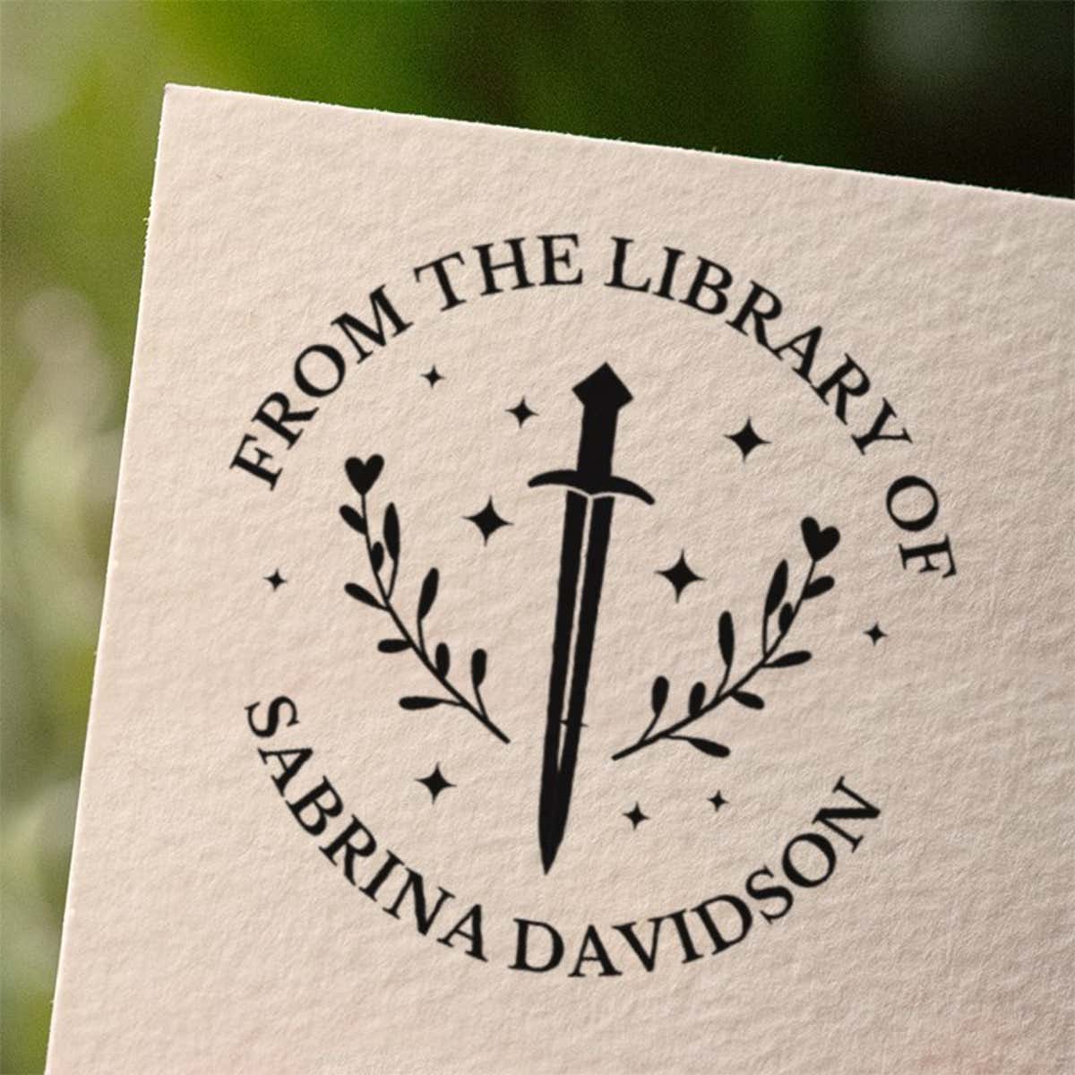 Personalized book stamp impression on white paper