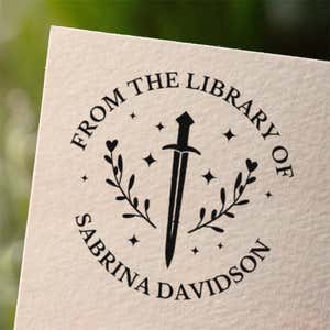 Personalized book stamp impression on white paper