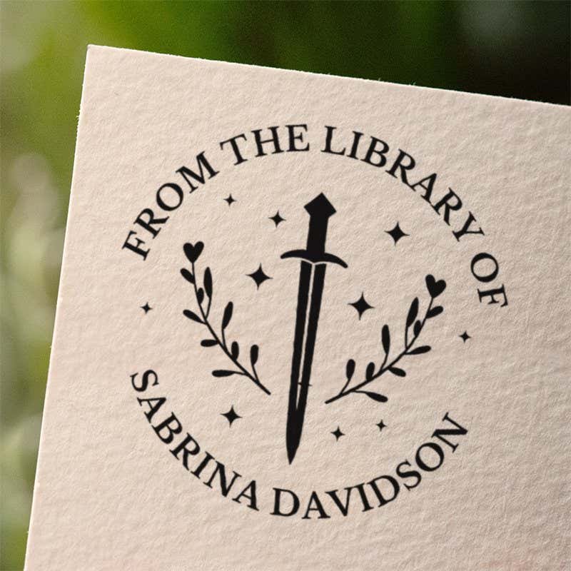 Personalized book stamp impression on white paper
