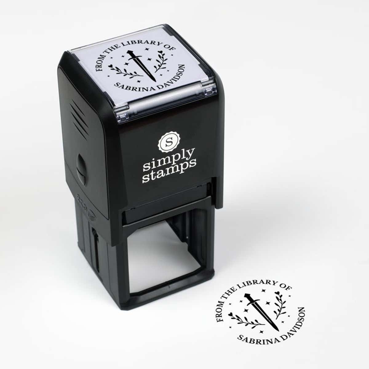 Library book stamp impression and self-inking stamp body with white background
