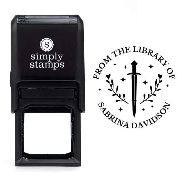 Front view of self-inking stamp body with library book stamp impression example