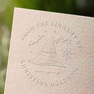 Witchy custom book embosser impression on paper
