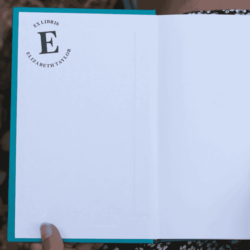 From the Library of Serif Teacher Stamp Impression