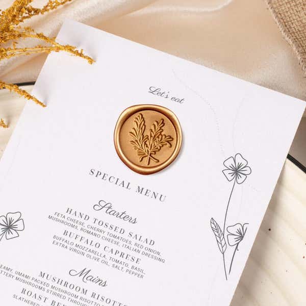 Gold Wax Seal Sticker, Rosemary Design Placed on a  Wedding Menu