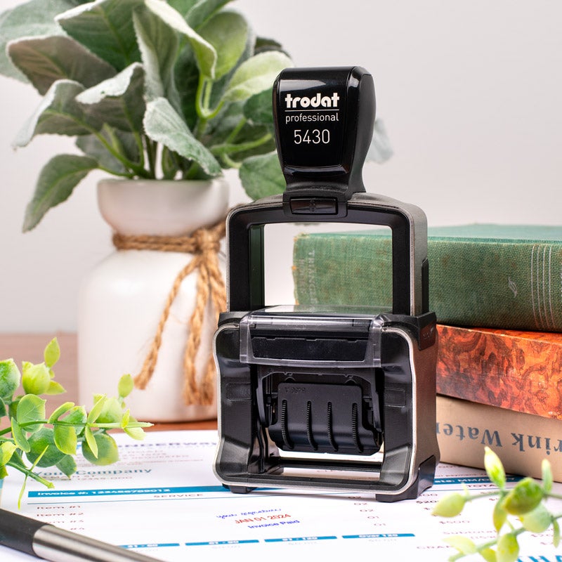 Professional custom stamp being used in an office workflow