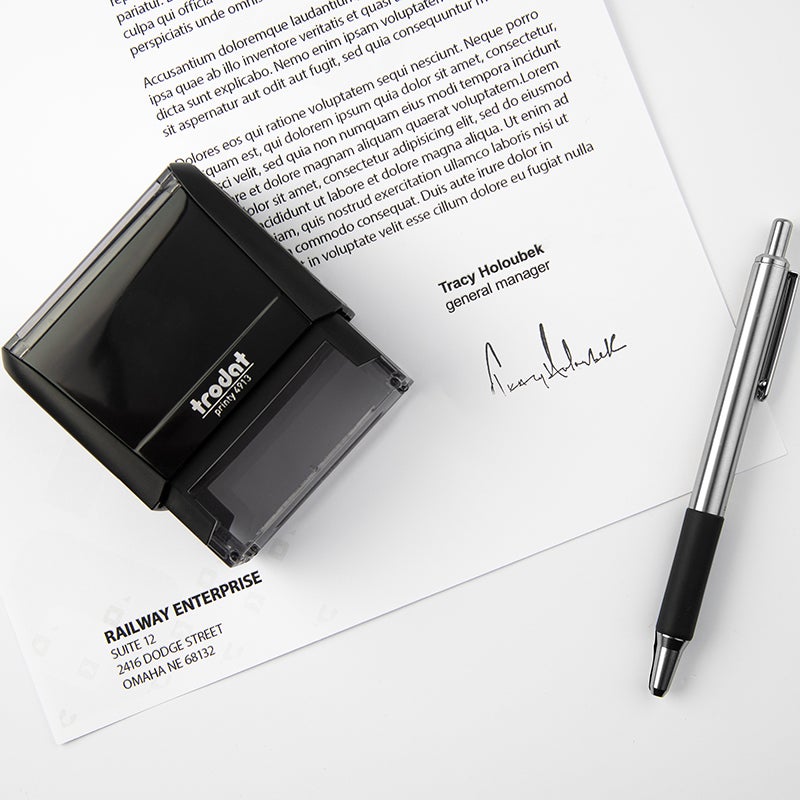 Custom signature stamp being used on a business invoice