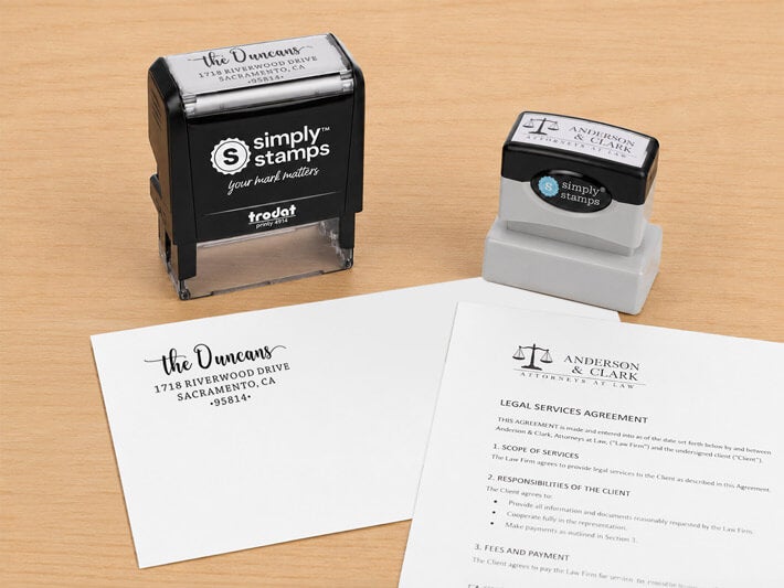 Differences Between Self-Inking and Pre-Inked Stamps, Woman Sitting with Stamps at a Desk
