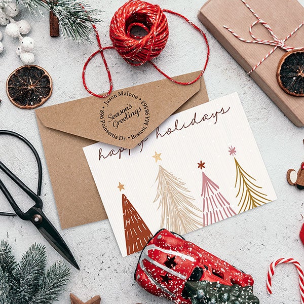 Collection of holiday return address stamps with festive designs